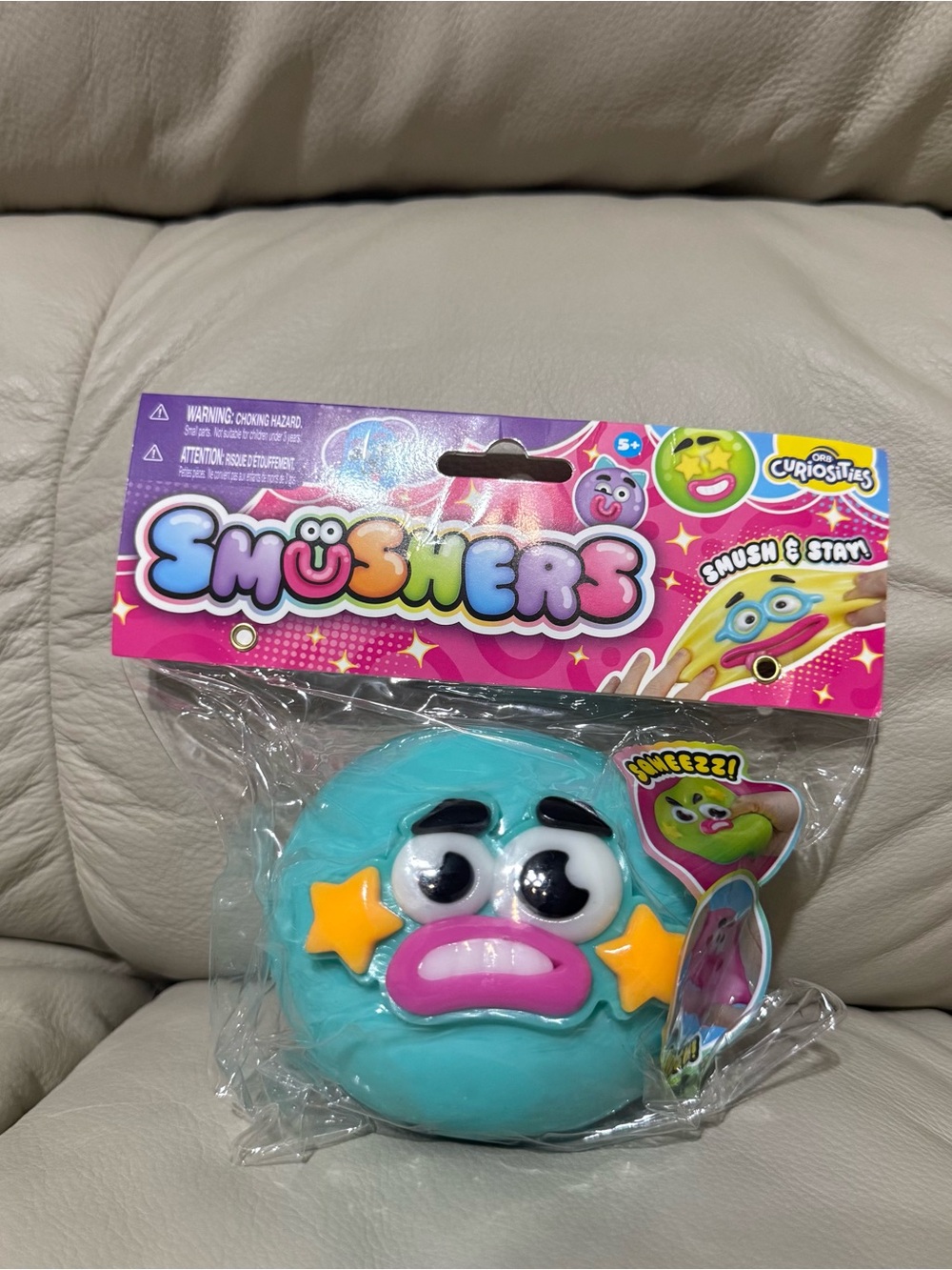 ORB Curiosities Smushers Squishy Toy Aqua Blue Yellow Star Face NEW
